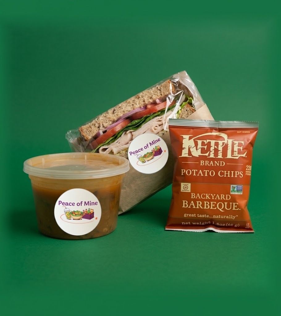 A Peace of Mine lunch bundle: sandwich, side salad and smoothie